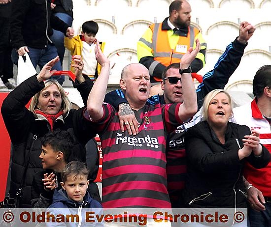 COME ON OLDHAM: fans celebrate the victory over Hull KR