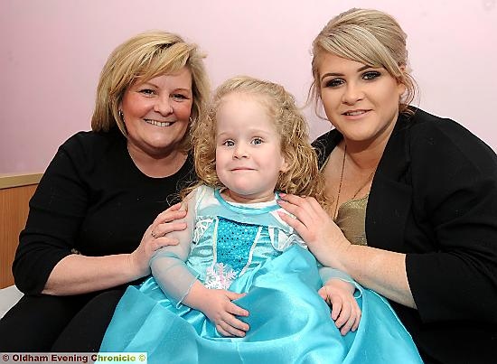 Millie Moran with gran Vicky Shaw and mum Heather Clarke