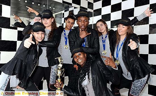 Dancers from Blades Academy qualified in Blackpool for the UDO Street Dance World Championship and Six Nations, as a team and also a duo. Team left to right, Charnaye Dudley, Alexa-Jae Greenidge, Chante Pilgrim, Tatenda Mashonganyika, Nicole Borges, Nicole Brown. Artistic director Yolande Blades pictured in front with trophy.