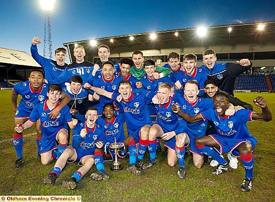 Loud and proud.. Athletic's under-18s celebrate Lancashire FA Youth Cup success last night