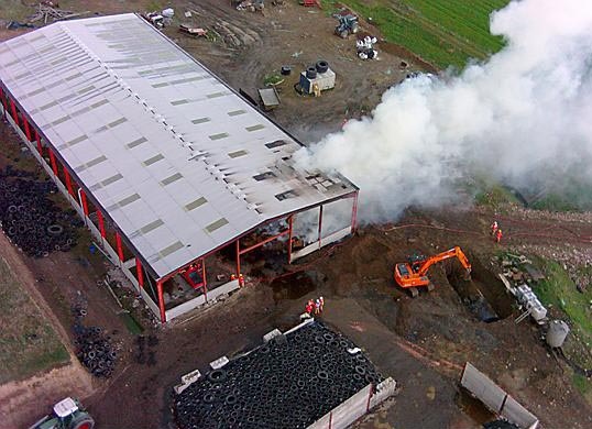 Air view of the fire at a barn in Round Hill Farm, Dobcross - photo from Greater Manchester Fire and Rescue Air Unit.