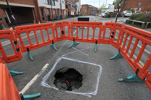 Subsidence causes sink hole to appear on Fields New Road in Chadderton.
