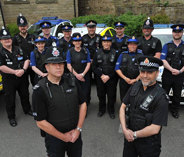 Saddleworth police on parade at Uppermill police station. PIC shows (back) L-R: PC Lee Cullen, PC Mark Clough, PCSO Jennifer Ballagher (CORRECT), PCSO Wayne Turley, PCSO Mark Detheridge, PCSO Rachel Woodhouse, PC Stuart Bielawski, PCSO Monica Rowley, PCSO Mike Lowther, PCSO Lorna Conway, PC Jonny Marsden, PCSO Lee Lockwood. FRONT: Sergeant Neil Barker and Inspector Mohammed Anwar. 
