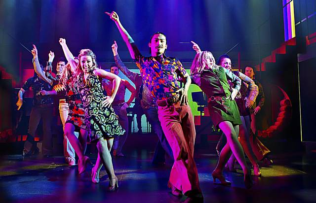 Dancing, Seventies style in jackie, The Musical. Picture