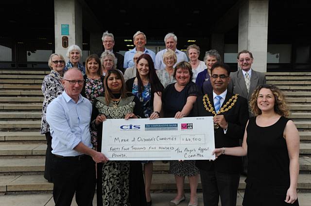 Presentation of ?42,500 to Local Charities as a Result of the Mayor of Oldham Cllr Ateeque  Ur -Rehman's year as Mayor

FRont holding Cheque Steve Carroll Ace Centre North, Cllr Yasmin Toor Mayoress,Lisa Pearson Dr Kershaws, Julie Davies Christies Oldham, Cllr Ateeque Ur- Rehman Mayor and Claire Taylor Action Oldham Fund.