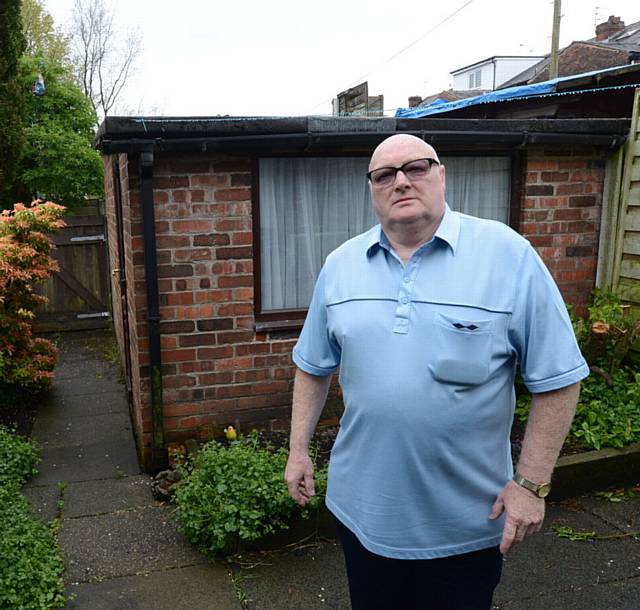 Derek Taylor complaining about the state of his neighbours' back gardens