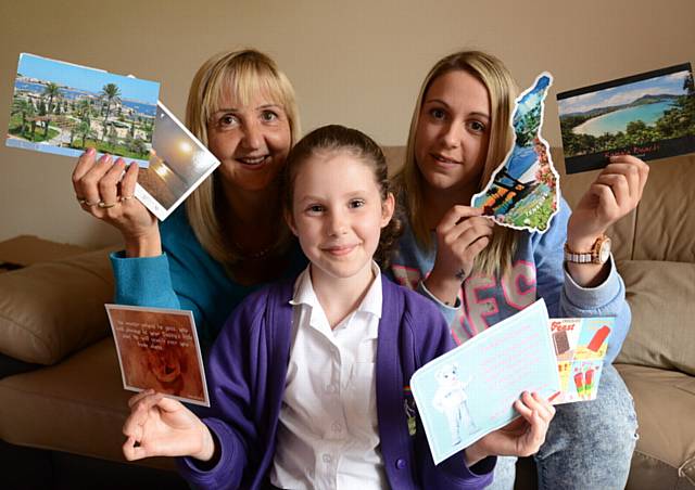 Keira-Louise Arnold (8) is collecting postcards in a bid to raise money for Dr. Kershaw's Hospice, via an appeal on Facebook. Pic with her grandmother Julie Smith (left) and mother Stacey Arnold (right).