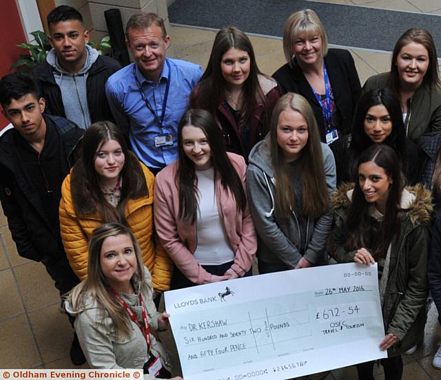 Oldham Sixth Form College students and staff present £672 to Dr Kershaw's Hospice. PIC shows Cheryl Calverley (with cheque on left) from Dr Kershaw's and students and staff. 
