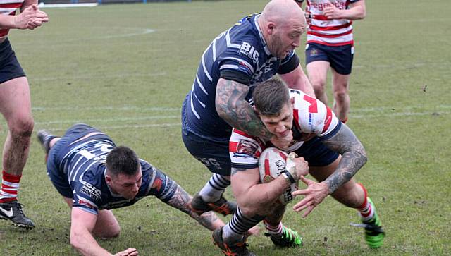 DIVING IN . . . Kenny Hughes crashes over the Featherstone line. PICTURES by PAUL STERRITT