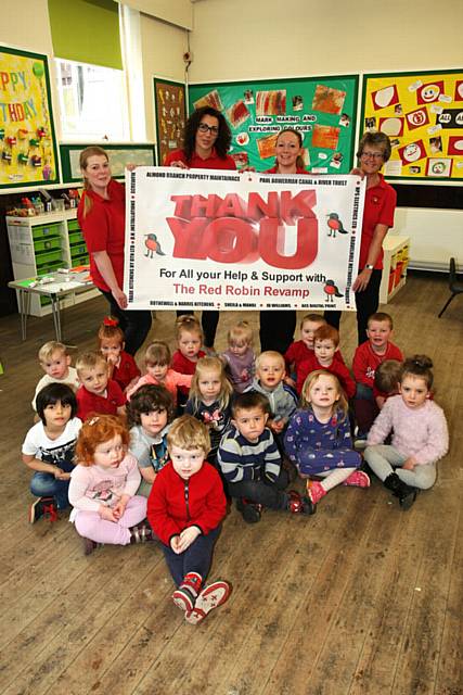 Red Robin pre-school in Thornham, Oldham, has undergone a revamp due to fundraising and donations from local businesses. Staff members (back left to right) Fay Morris, Janine Lightfoot, Emma Browitt and Janet Marshall with their thank you banner.