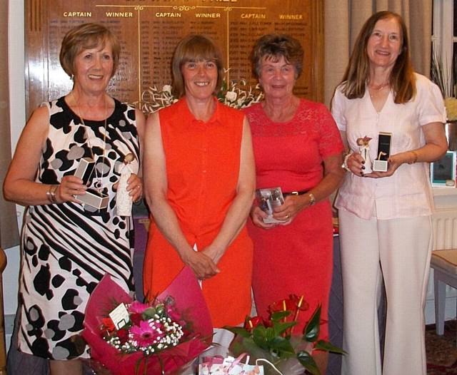 PRIZE TIME . . . lady vice-captain's day at Werneth GC. Pictured are Christine Moon (left), lady vice-captain Gail Rowbotham, Pauline Day and Glynis Joyce