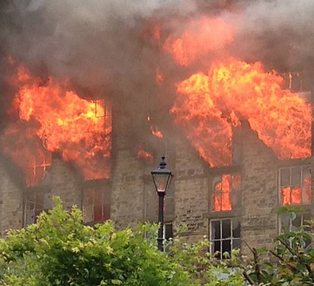 RAGING ... the blaze rips through Bailey Mill. Picture: Justine Potter