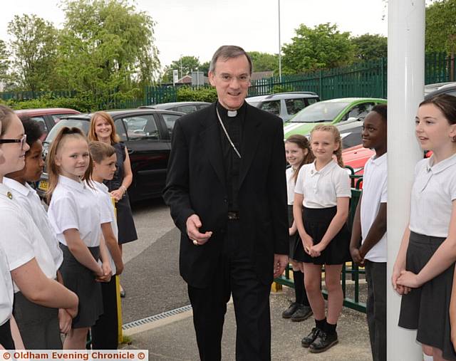 The Bishop of Salford John Arnold visits St. Anne's RC Primary School to bless its new prayer garden, after a personal invitation by the pupils.