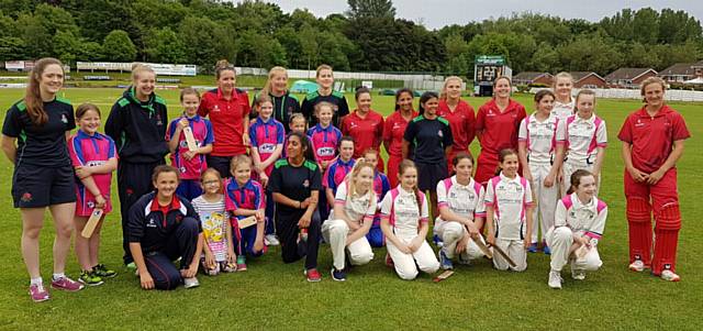 OUR HEROES . . . Heyside Hyenas and Brooksbottom with players from Lancashire Thunder