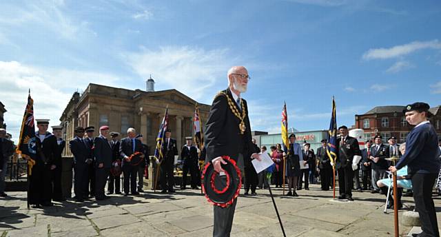 THE First wreath was laid by Mayor of Oldham Cllr Derek Heffernan on behalf of the people of the borough