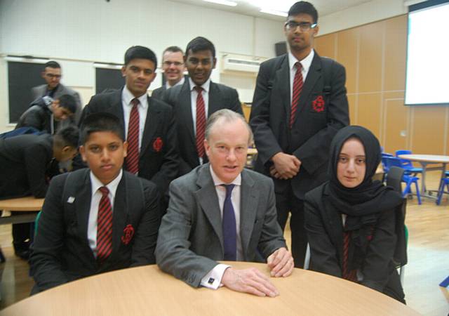 Alex Aiken, the government's executive director of communications, with Radclyffe School pupils (from left) Kasim Miah, Raihan Shah, Abu Taher Misba, Ali Ahmed and Henna Bibi.