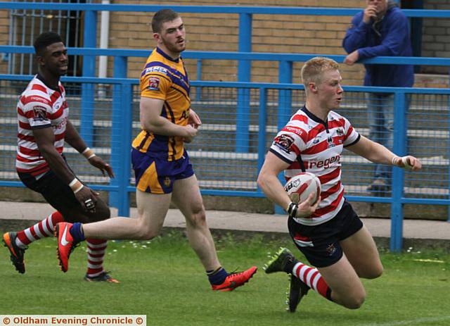 DEBUT TRY . . . On-loan Castleford man Kieran Gill goes over for an Oldham score shortly before half-time