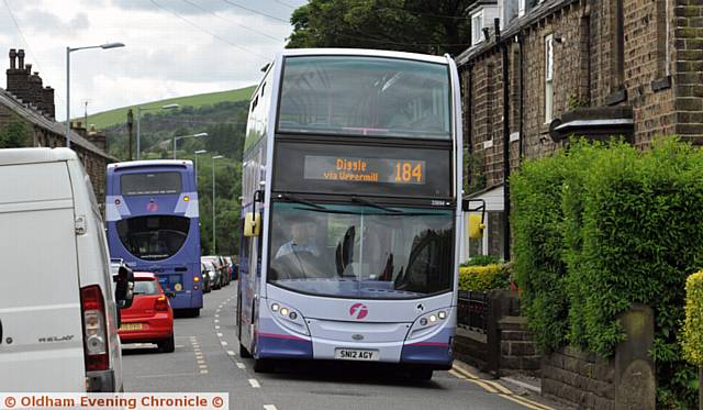 Bus service 184 pictured on Huddersfield Road in Diggle.
