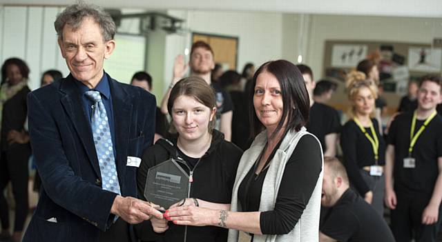 ALL yours . . . Mike Harnor, a member of Epilepsy Action's management council, presents an Education Action Award to student Victoria Slater and support facilitator Jill Hattersley, both from Oldham College