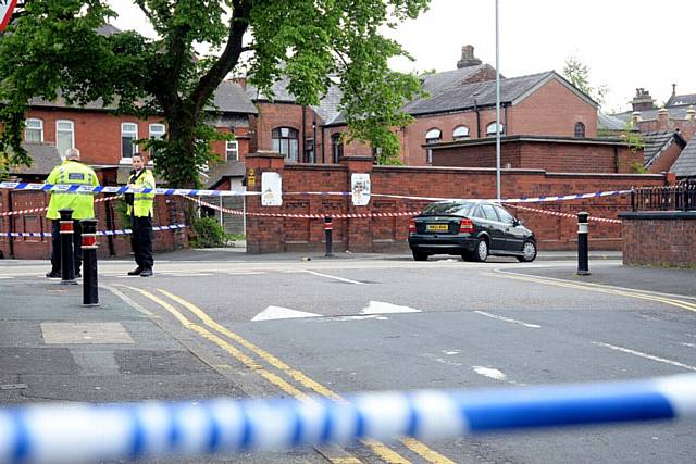 Park Road, Oldham closed off around 6.45pm as police investigate incident on crossing near junction of Hardy Street.
