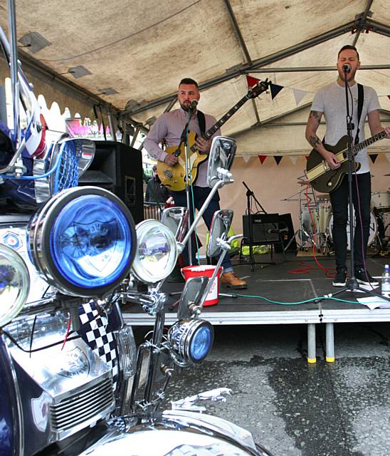 band OK Broken entertain the crowd at the Vintage Car Show 