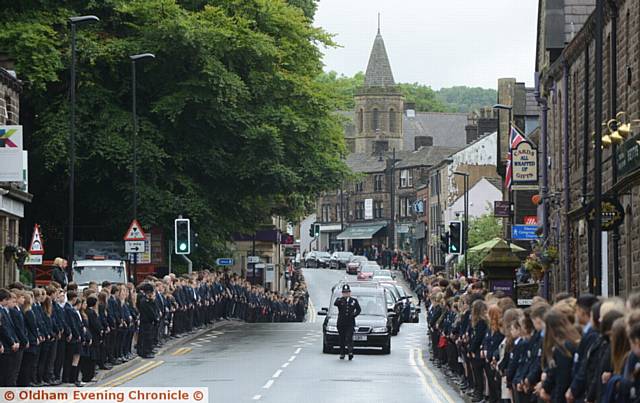 STUNNED silence . . . the funeral cortege of Tyrese Glasgow in Uppermill