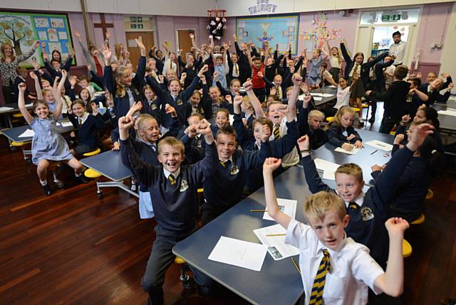 Pupils at St. Anne's Lydgate Primary School take part in the Guinness World Record for the world's largest reading lesson, along with over 70 other schools nationally. 
