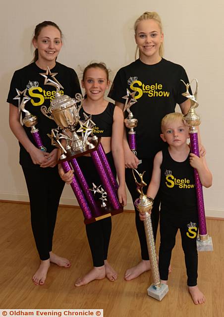 Dancers at Jason Steele School of Dance Lauren McGuire (back left) and Lucy Owen (back right), both 14 reached the finals of the Freestyle World Championships in Blackpool. Bella Molyneux (front left), 11 won the under 12s Prem and Adam Parry, 5 (front right) won the under 6s Prem.