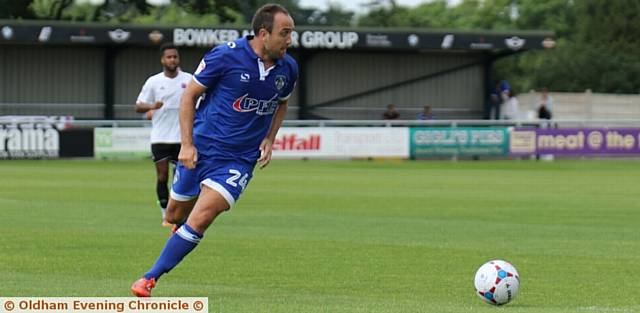 STRIDING OUT . . . Athletic's Lee Croft