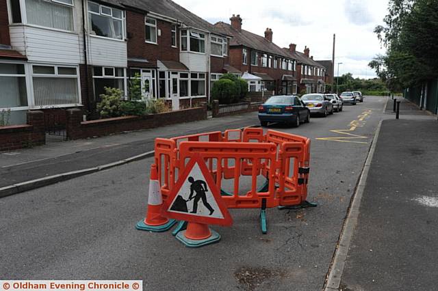 CORDONED off . . . the sink hole on Alcester Street, Chadderton