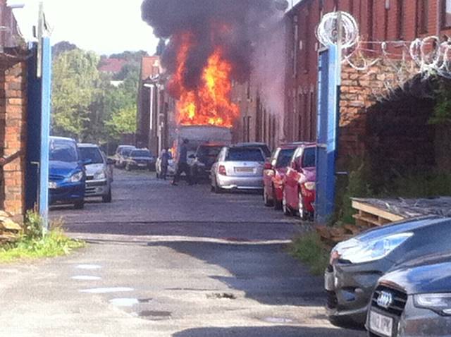 UP in flames . . . the caravan at Taurus St Hill Stores