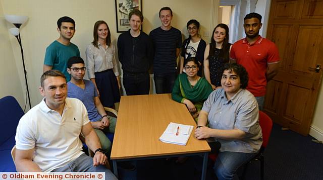Kevin Sinfield, left, and refugee Marzia Babakarkhail, right, meet students at the summer school