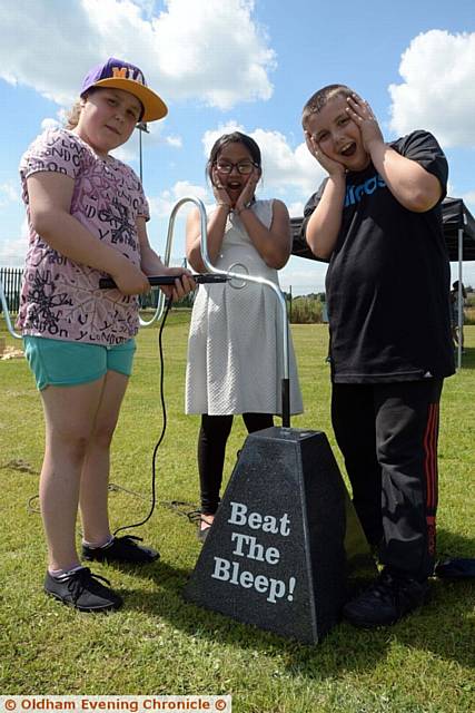 Hathershaw College Transition Week. Beat the beep game (l-r) Sandra Fisherovra (11), Lisha Akther (10) and Billy Wilcock (10)