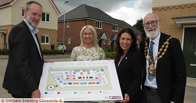 DEVELOPMENT . . . (from left) Matthew Harrison, chief executive of Great Places housing group; Lisa Westerman, group head of sales; Debbie Abrahams, MP for Oldham East and Saddleworth; and Oldham Mayor Councillor Derek Heffernan at Leesbrook View
