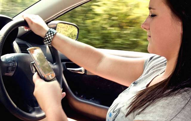 MOBILE phones are being used by 55 per cent of drivers in Oldham