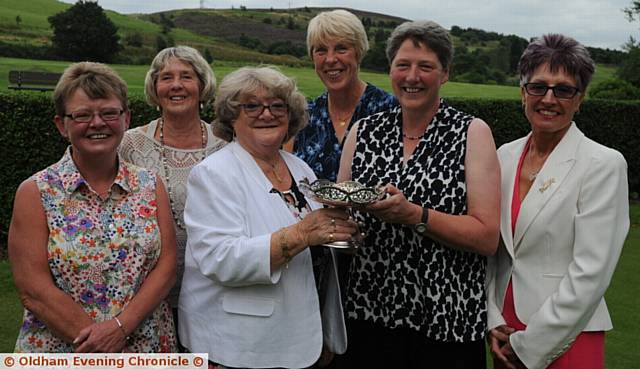 SILVER LINING . . . Oldham Golf Club Lady Captain's Prize presentation, with winner Janet Thorpe (second, right) receiving her trophy from lady captain Edith Howarth. Also pictured runner-up Linda Hall (left), Florence Jacks (subsidiary), Chris Peirson (best gross) and Lynn Kershaw (first day prize). Not pictured: Jill Nolan, second day prize and Bunty Booth qualifier