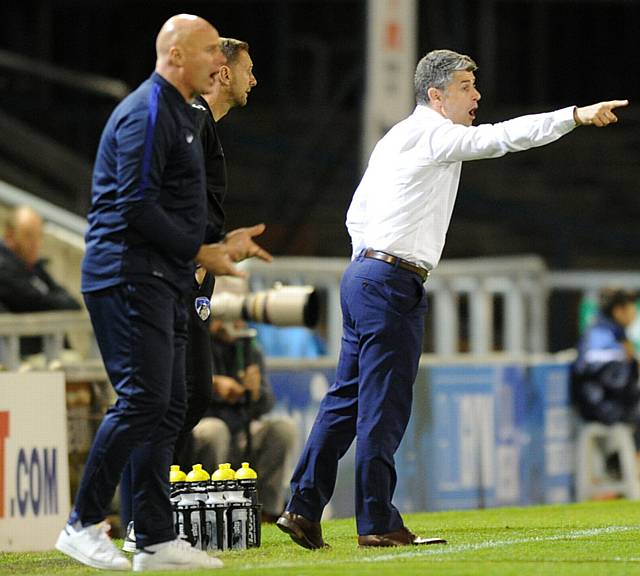 DIRECTING OPERATIONS . . . Athletic manager Stephen Robinson gets his point across at SportsDirect.com Park last night