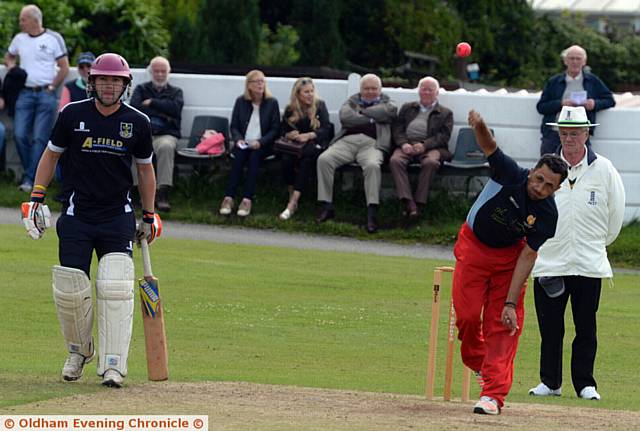 RIGHT-ARM OVER . . . Delph seamer Mohammed Shakir strives to take a wicket