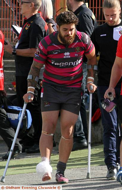 DAMAGED ANKLE . . . Sammy Gee came out on crutches to watch Oldham at Bradford