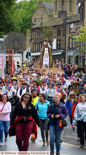 BUZZ ...  a packed Uppermill greets the Rushcart