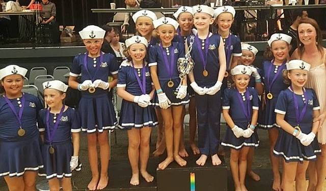 RAZZLE Dazzle under nine team Navy Sailors (above) from Pure Dance Academy, in Derker, with principal teacher Rebecca Jarvis.
