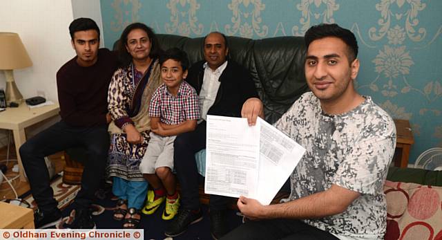 SO proud of you son . . . Danyal Umar with his pass papers and his family, from left, brother Dawood (15), mother Alia Sadiq, brother Louis (9) and father Tanweer