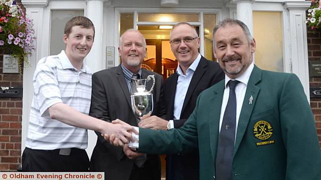 WINNERS: Ben Gledhill, Andy Williamson and David Harris receive the trophy from R&C president Steve Horritt