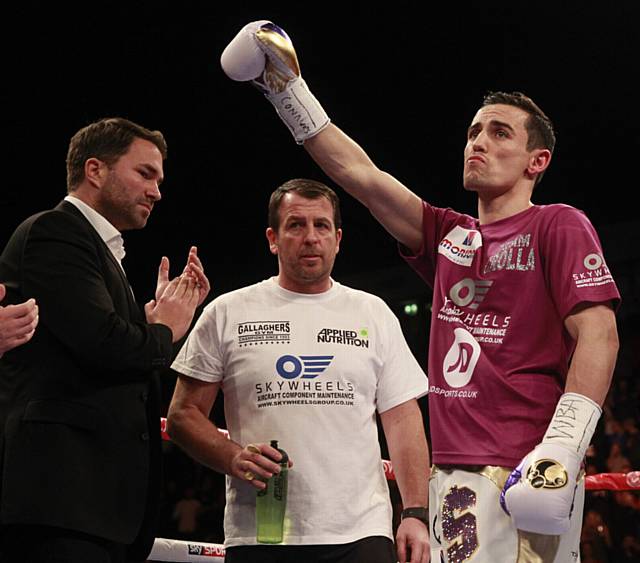 CHAMP . . . Crolla (right) with Eddie Hearn and trainer Joe Gallagher