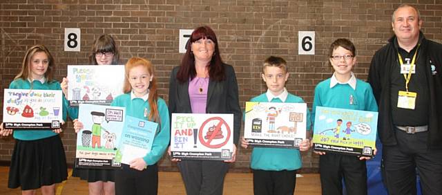 COUNCILLOR Diane Williamson and Mark Greenhalgh with Royton & Crompton pupils including winner Gracie (third from left)