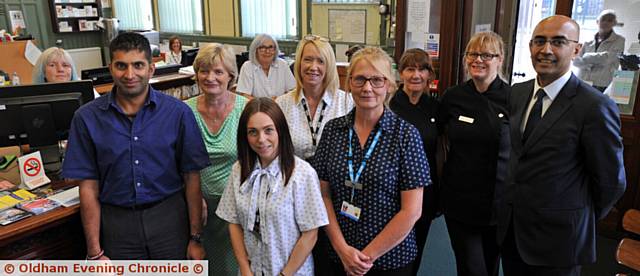 PRIDE in Oldham nomination for Pennine Medical Centre in Mossley, pictured are GPs, nurses and reception staff including Dr Bal Duper, right