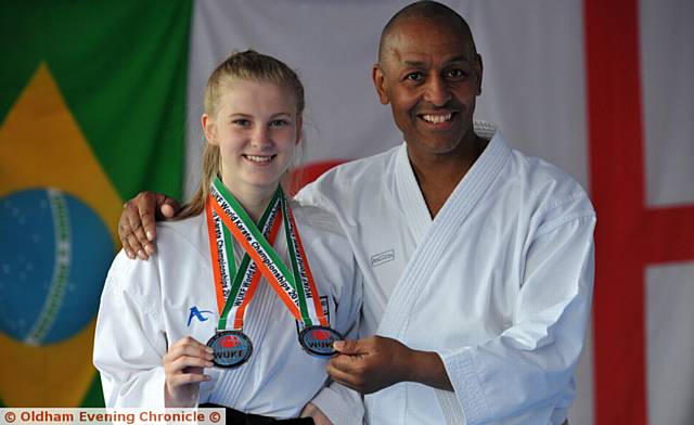 ANOTHER INTERNATIONAL ADVENTURE BECKONS: Natasha Watkins won two silver medals at the World karate championships in Dublin. 

She is pictured with her dedicated instructor Marc Leacock
