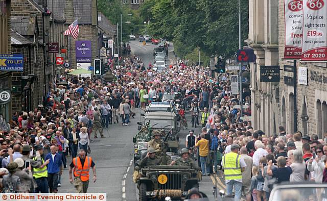 A PREVIOUS Yanks parade through Uppermill  is enjoyed by hundreds of people