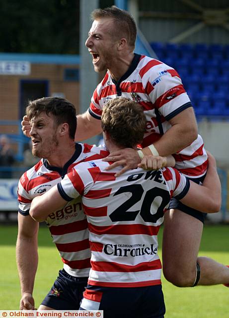 PLENTY TO SHOUT ABOUT . . . Lewis Palfrey (left), Gareth Owen and Adam Clay celebrate at the final whistle