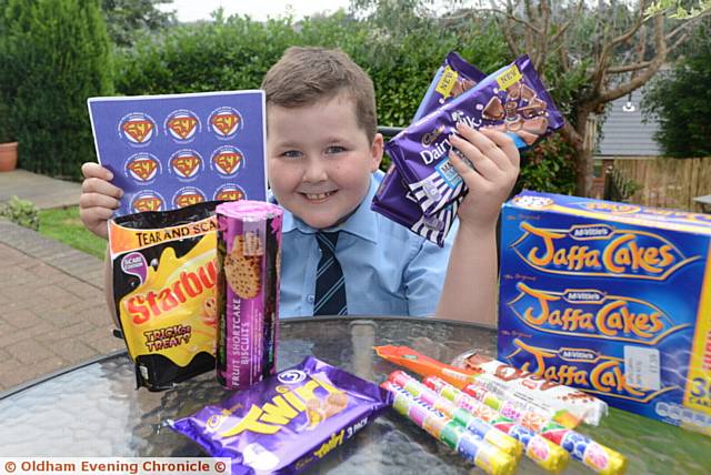 Pride in Oldham nominee Alfie Barlow-Wood (7), who raised over £200 for the Joshua Wilson Brain Tumour charity by selling cakes, chocolates and other goodies outside his Royton home.